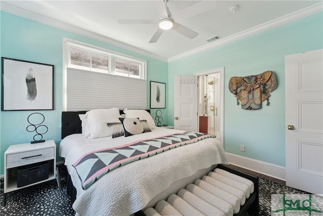 bedroom with crown molding, ceiling fan, and ensuite bathroom