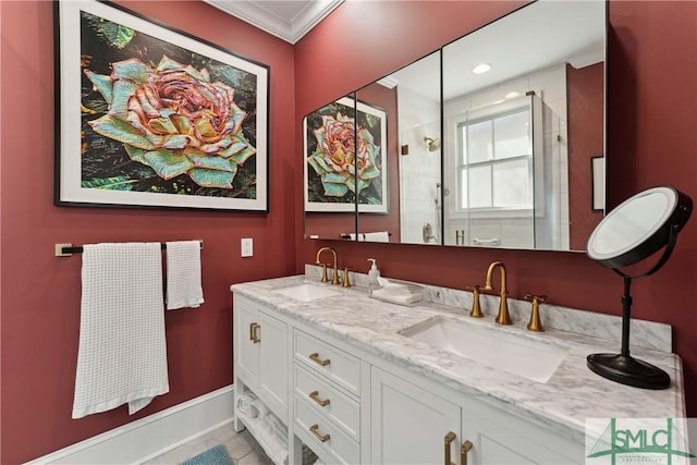 bathroom featuring crown molding, vanity, and an enclosed shower