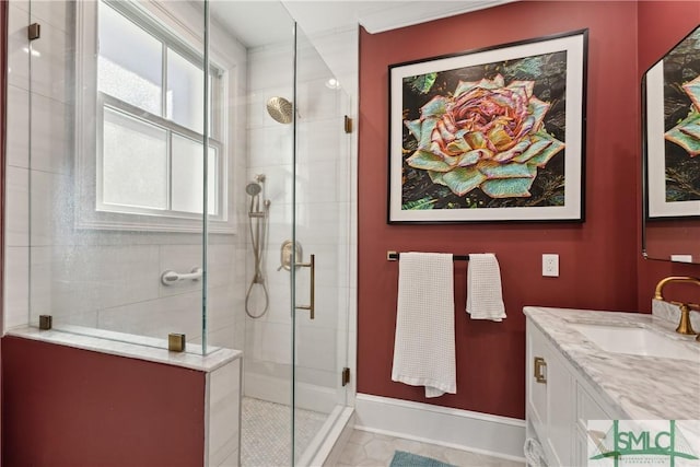 bathroom with an enclosed shower and vanity