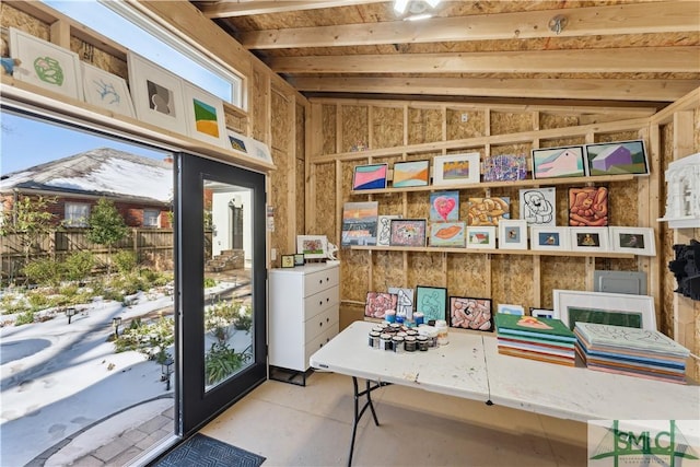 home office featuring vaulted ceiling