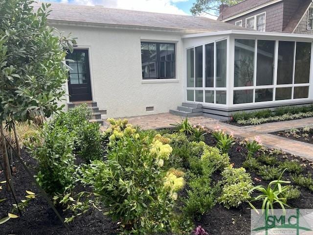 rear view of property with a patio area