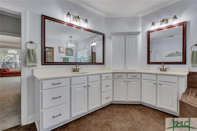 bathroom featuring vanity, tile patterned floors, and ornamental molding