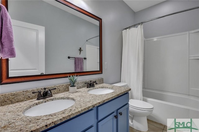 full bathroom featuring vanity, shower / bathtub combination with curtain, tile patterned floors, and toilet