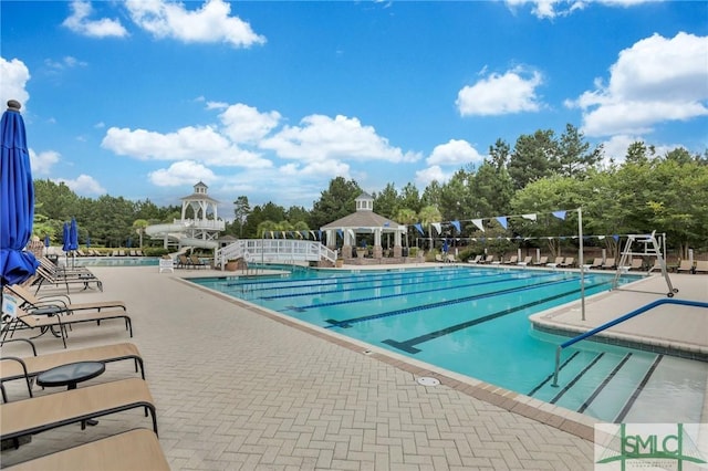 view of pool featuring a gazebo and a patio area