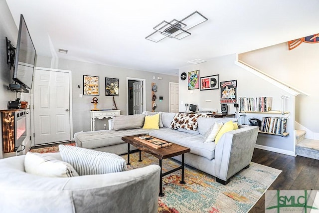 living room with dark hardwood / wood-style floors