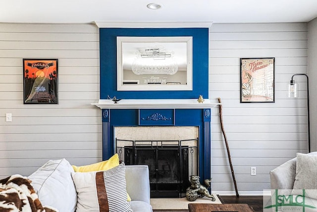 living room featuring a fireplace