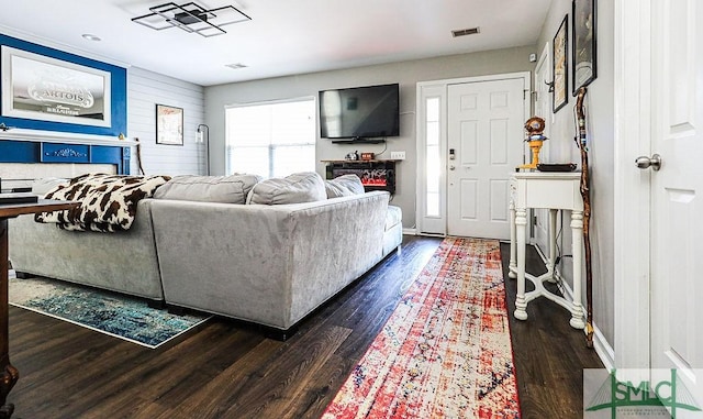 living room featuring dark wood-type flooring