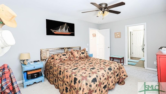 carpeted bedroom with ceiling fan