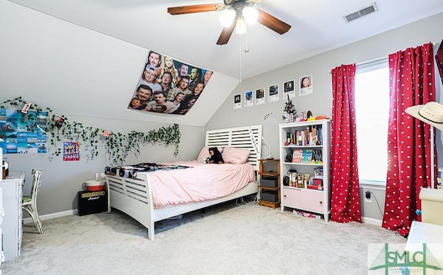 bedroom with multiple windows, lofted ceiling, carpet floors, and ceiling fan