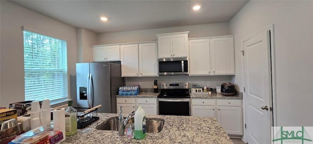 160 Kraft, Pooler, GA 31322 - kitchen featuring light stone counters, white cabinets, and appliances with stainless steel finishes