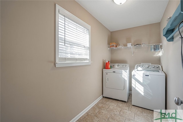 laundry room with washer and clothes dryer