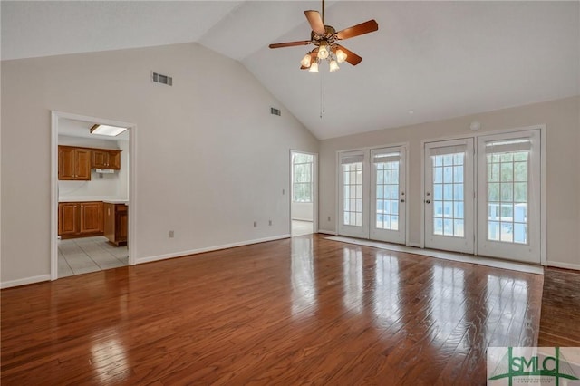 unfurnished living room with lofted ceiling, light hardwood / wood-style flooring, and ceiling fan