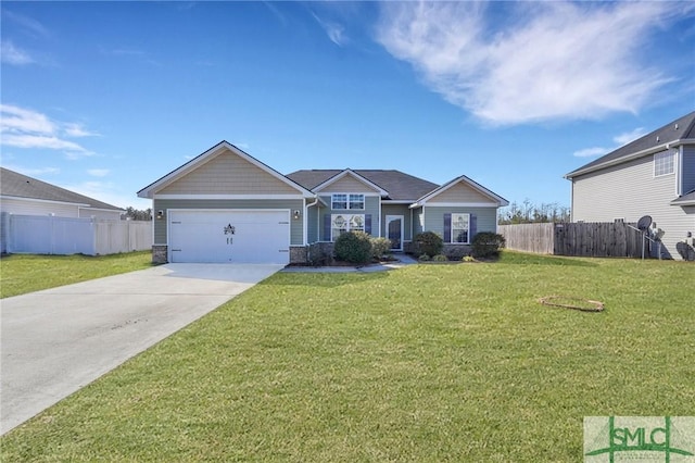 view of front of house featuring a garage and a front yard