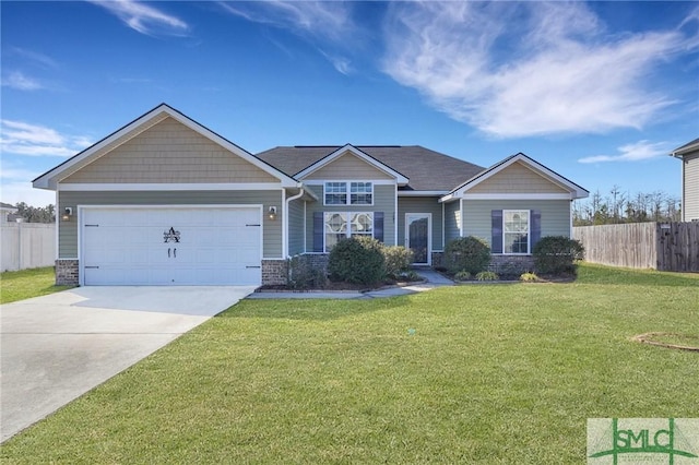 view of front of house featuring a garage and a front lawn