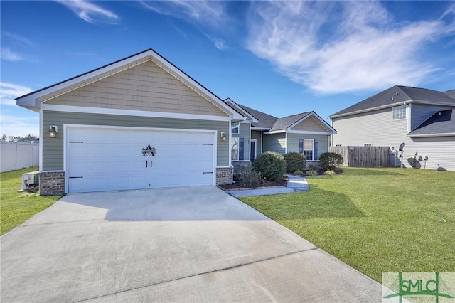 view of front of property featuring a garage and a front yard