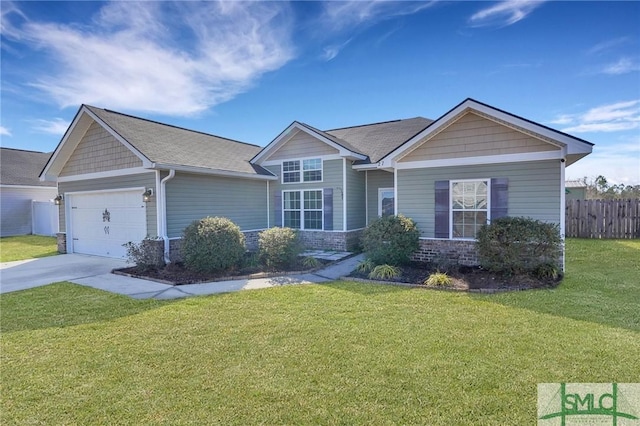 ranch-style home featuring a garage and a front lawn