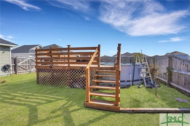 view of yard featuring a swimming pool side deck