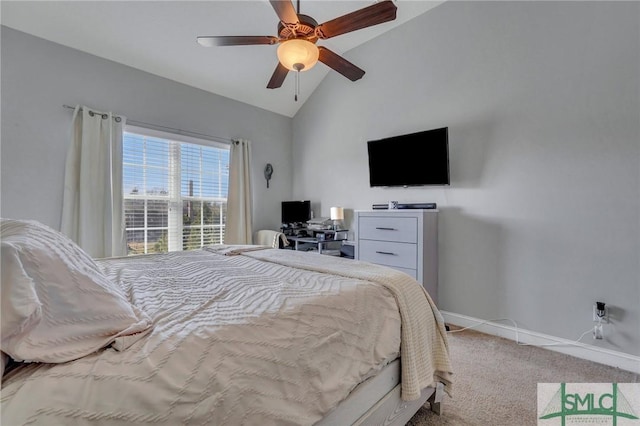 carpeted bedroom with vaulted ceiling and ceiling fan