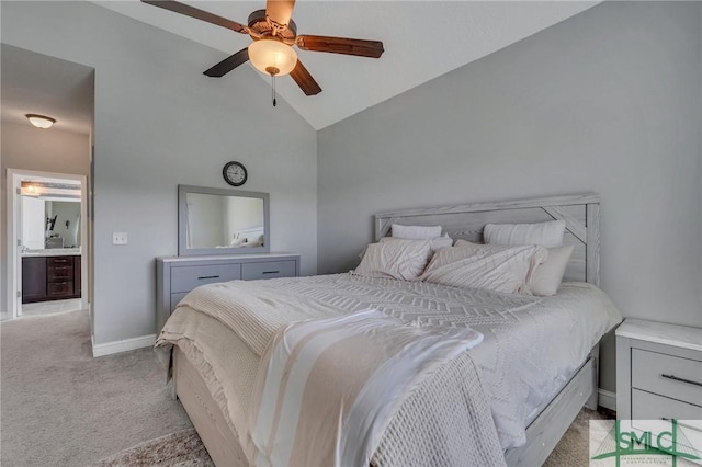 carpeted bedroom with ceiling fan and lofted ceiling