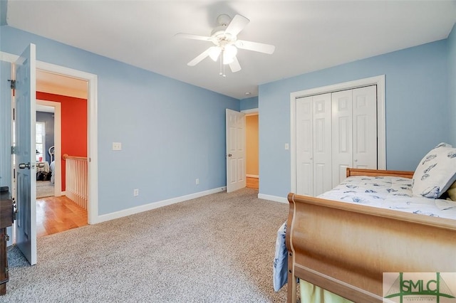 bedroom featuring carpet flooring, ceiling fan, and a closet