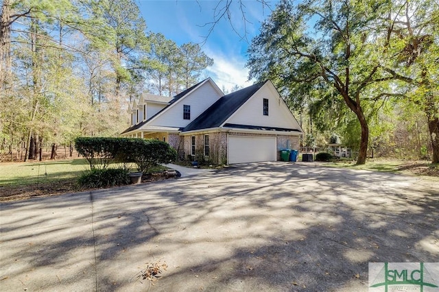 view of property exterior featuring a garage