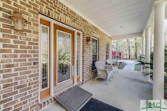 doorway to property featuring covered porch