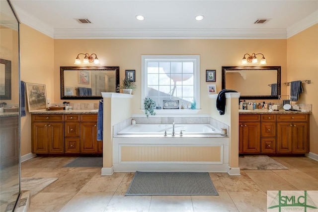 bathroom with vanity, a tub to relax in, and ornamental molding