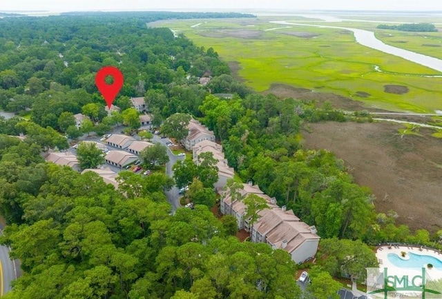 birds eye view of property featuring view of golf course