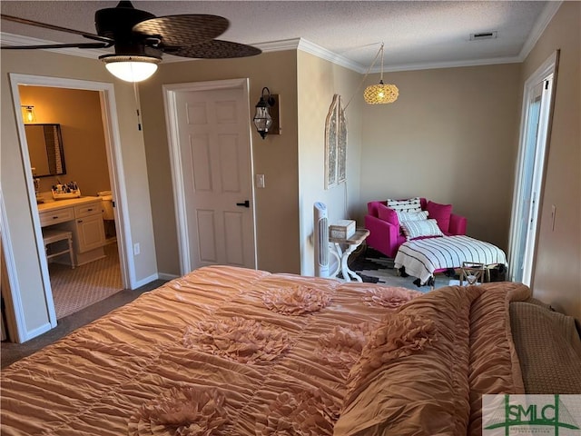 bedroom with connected bathroom, visible vents, crown molding, and a textured ceiling