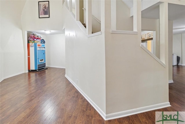 hallway featuring dark hardwood / wood-style floors