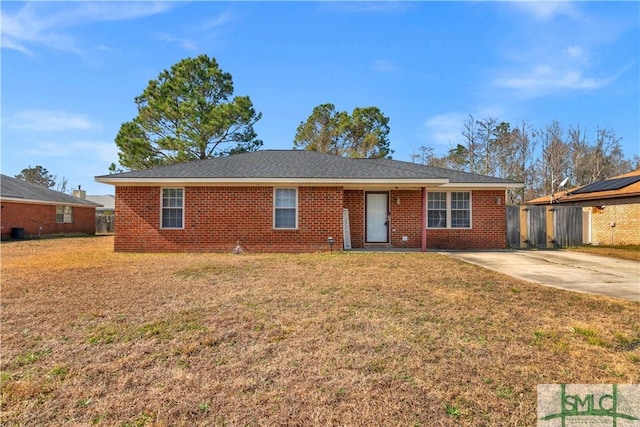 ranch-style house with a front lawn