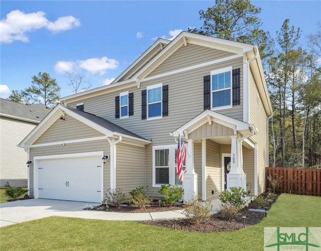 view of front of house with a garage and a front yard