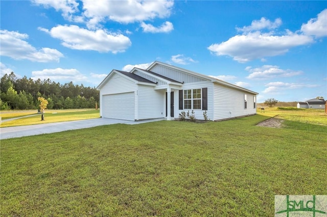 view of front facade with a garage and a front yard