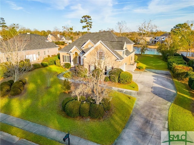 view of front of house featuring a water view