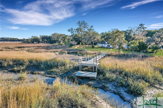 view of dock featuring a rural view