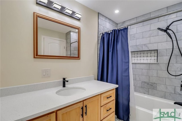 bathroom with vanity and shower / bath combination with curtain