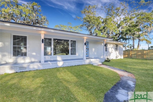 single story home with a front yard