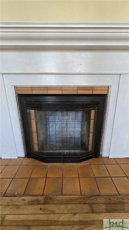 interior details with a fireplace