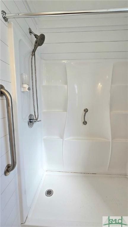 bathroom featuring a shower stall