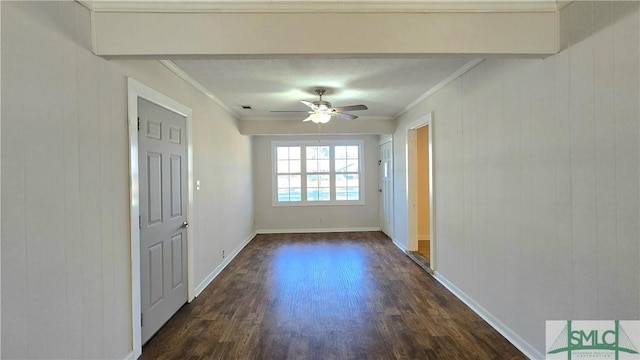 doorway with dark hardwood / wood-style flooring, ornamental molding, and ceiling fan