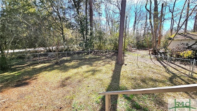 view of yard with fence