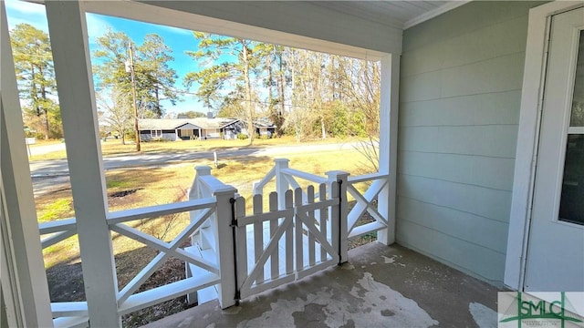 view of patio featuring fence