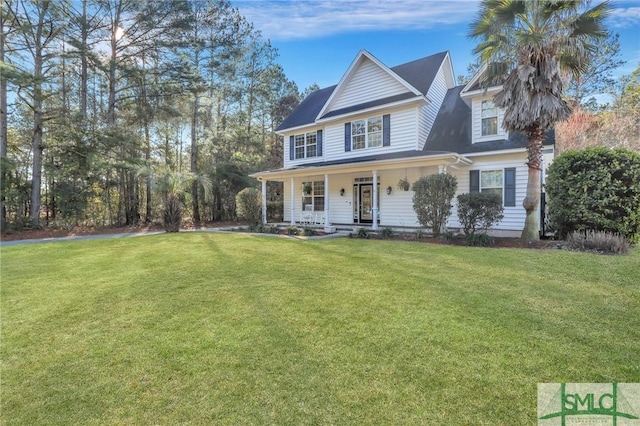 view of front of property featuring covered porch and a front lawn