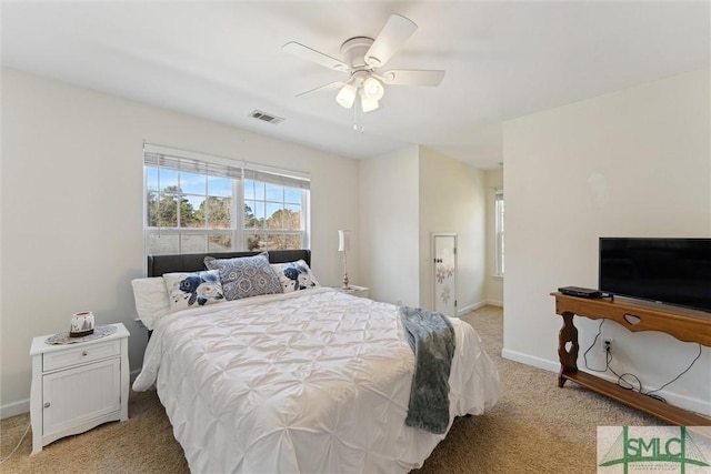 carpeted bedroom featuring ceiling fan