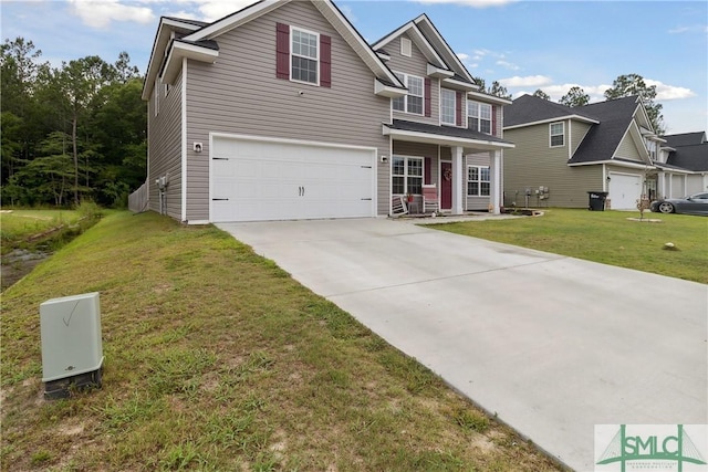 view of front of home with a garage and a front yard