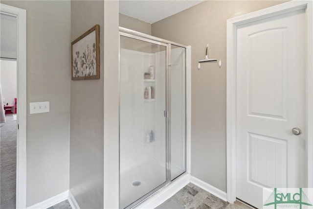 bathroom with an enclosed shower