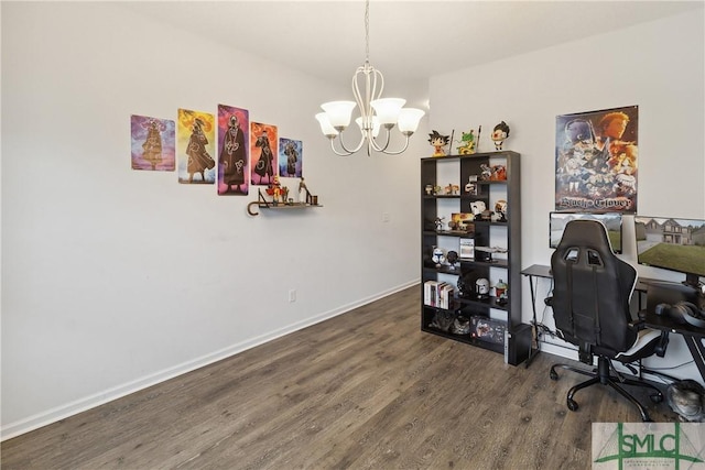 home office featuring dark hardwood / wood-style flooring and an inviting chandelier