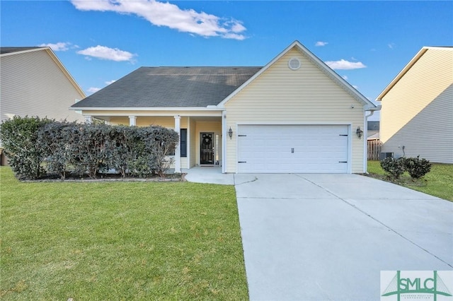 view of front facade featuring a garage and a front yard