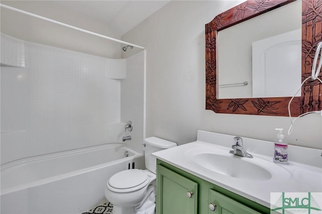 bathroom with vanity, shower / tub combination, and toilet