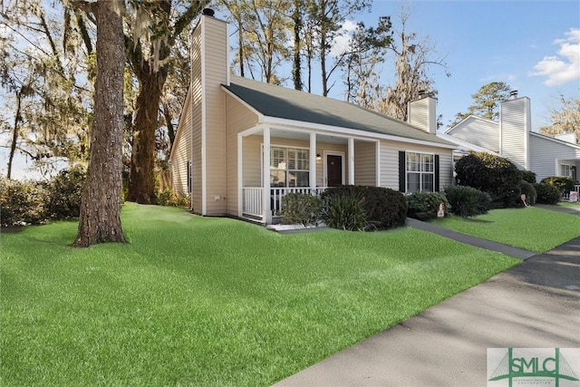 view of front of home featuring a front yard and a porch